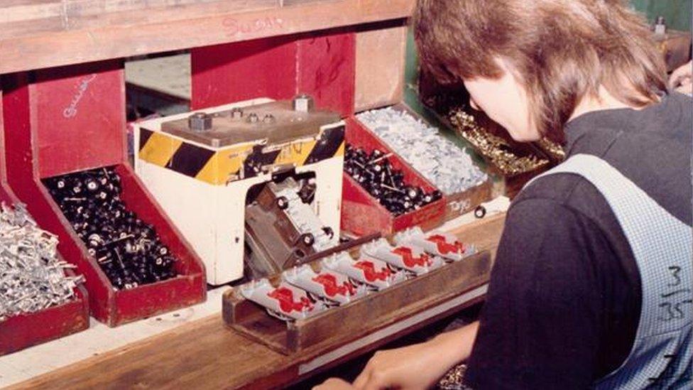 Parts being assembled on a workbench