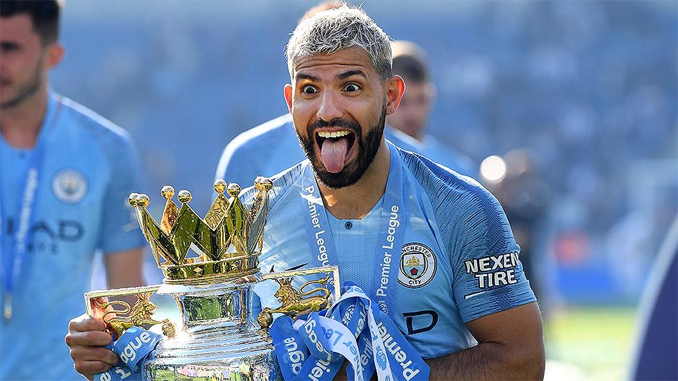 Sergio Aguero with the Premier League trophy