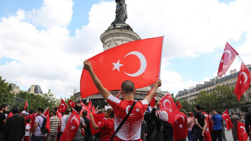 People gather to protest the failed military coup attempt in Turkey, on 16 July 2016 in Paris, France.