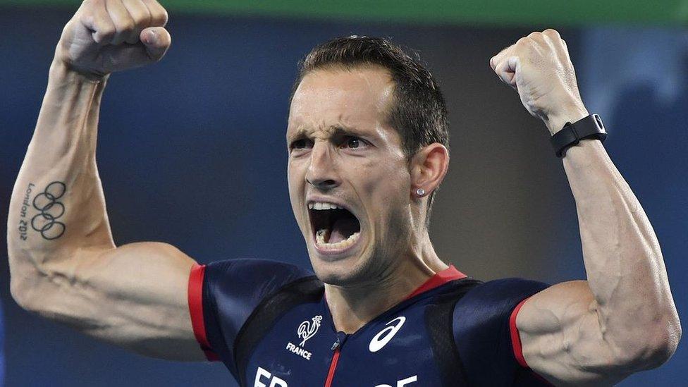 France's Renaud Lavillenie celebrates after a jump during the Men's Pole Vault Final of the athletics event at the Rio 2016 Olympic Games at the Olympic Stadium in Rio de Janeiro on August 15, 2016.