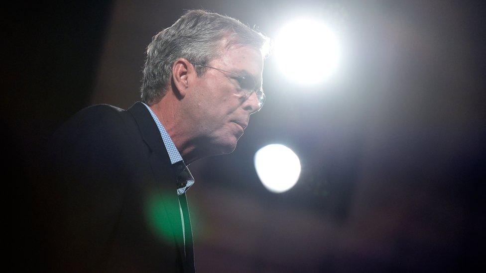 Jeb Bush with spotlights behind him