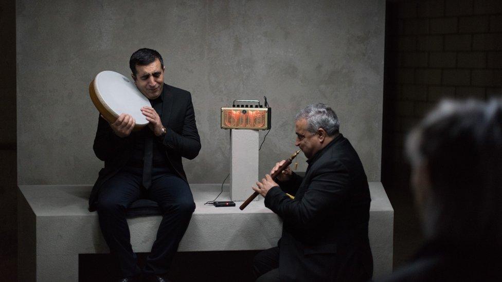 Anibal Gonzalez from Ecuador plays an accordion