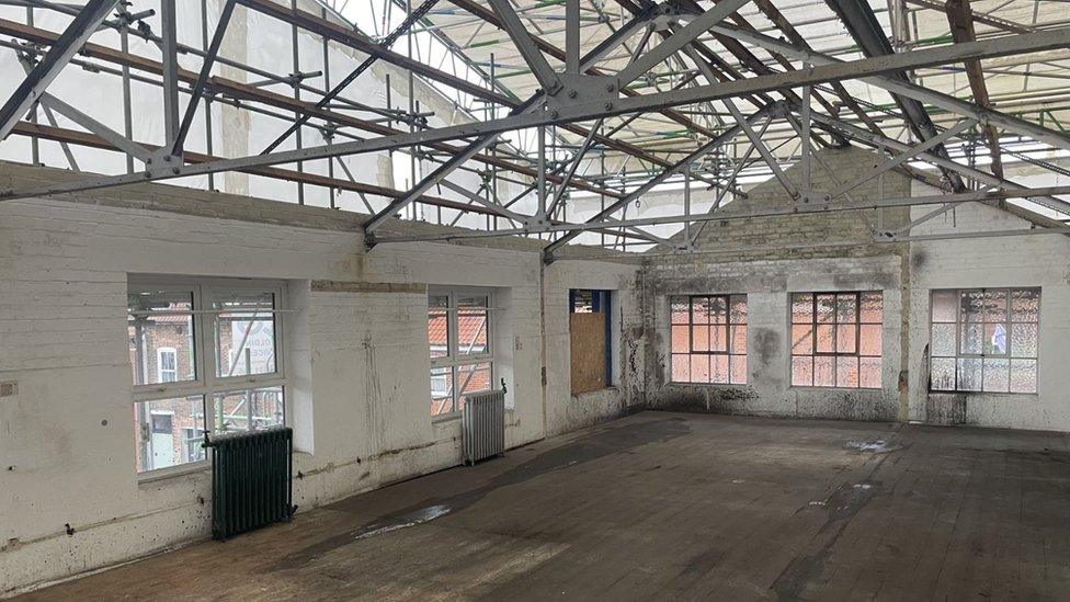 Stripped back roof at the old Palmers building