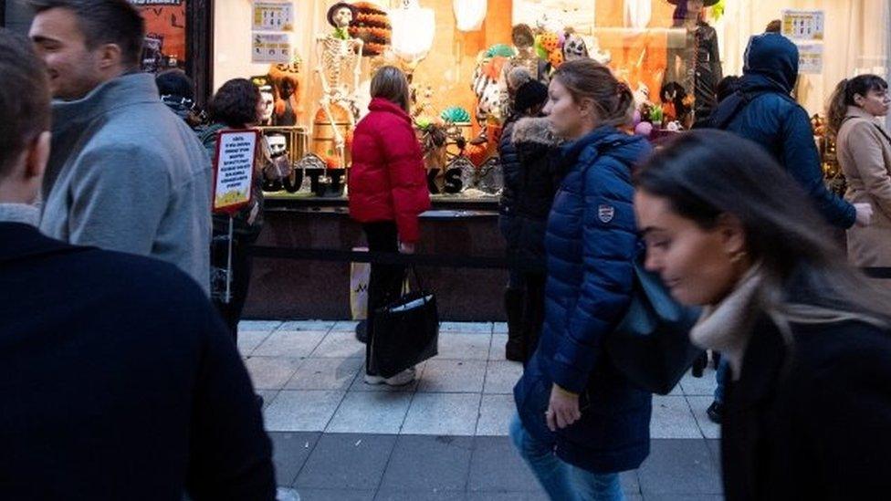 People walk in central Stockholm, Sweden. File photo