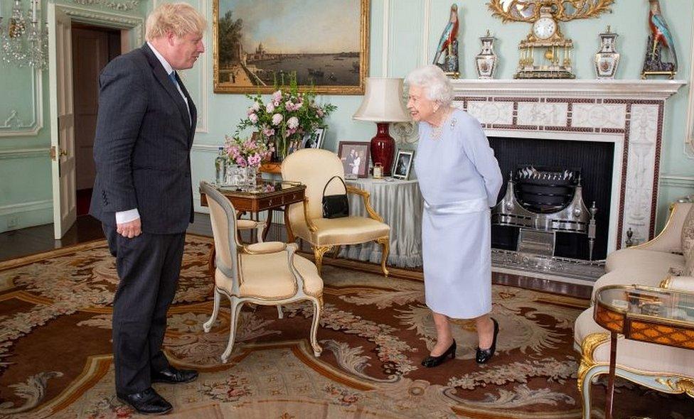 The prime minister meeting the Queen at Buckingham Palace