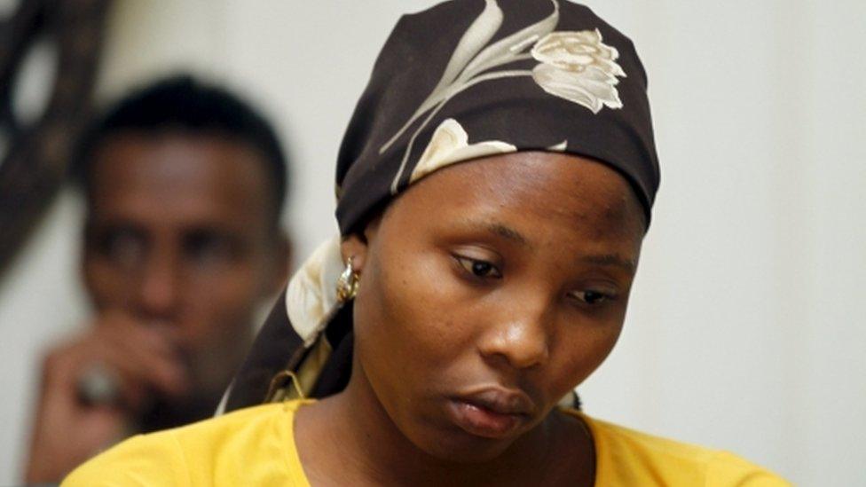 Rebecca Issac, a Chibok schoolgirl who had escaped from the Boko Haram, reacts during an event that marks the second anniversary of the Boko Haram abduction of Chibok schoolgirls, in Abuja