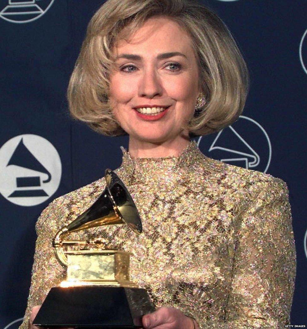 Hillary Clinton holding her Grammy award