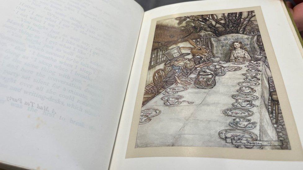 A vintage copy of Alice's Adventures in Wonderland which features in Leeds Central Library's new Fantasy exhibition.