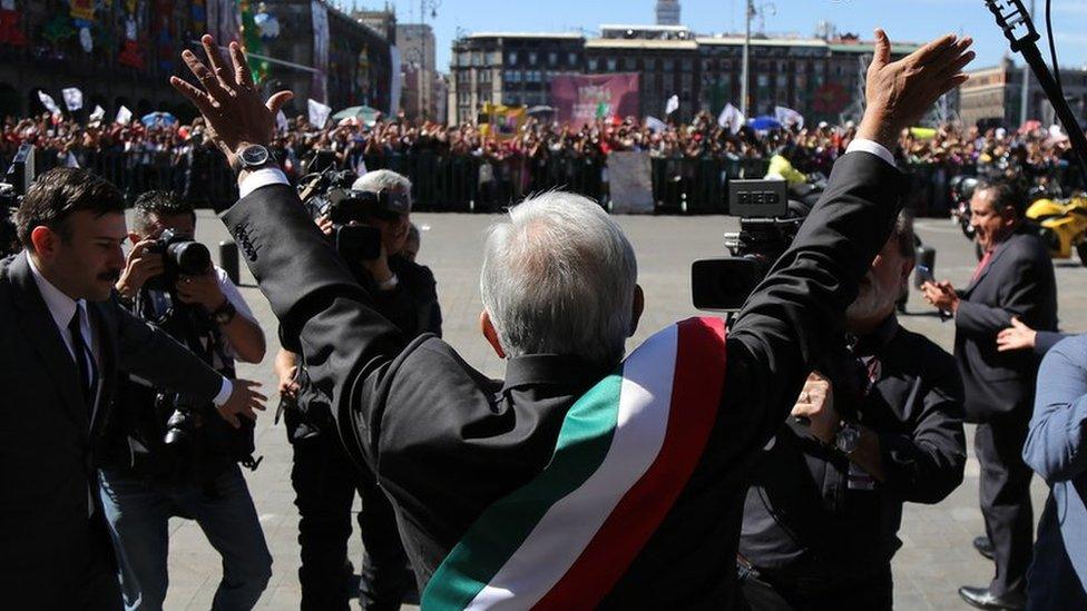 The new President of Mexico, Andres Manuel Lopez Obrador (C) arrives at the National Palace, in Mexico City