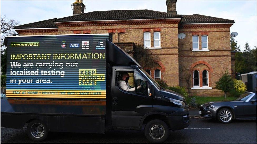 Van carrying testing message in Surrey