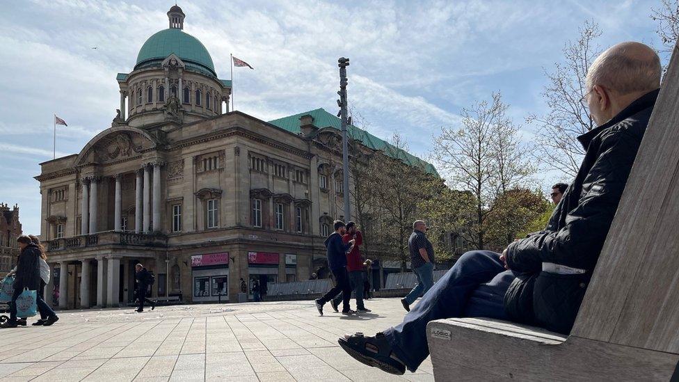 Union flags fly atop City Hall in Hull's Queen Victoria Square