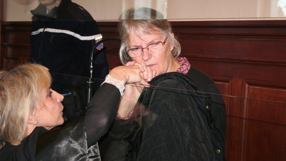 Jacqueline Sauvage (C), a French woman convicted of murdering her abusive husband, with her lawyer (no name given) in court in Blois, France, on 3 December 2015