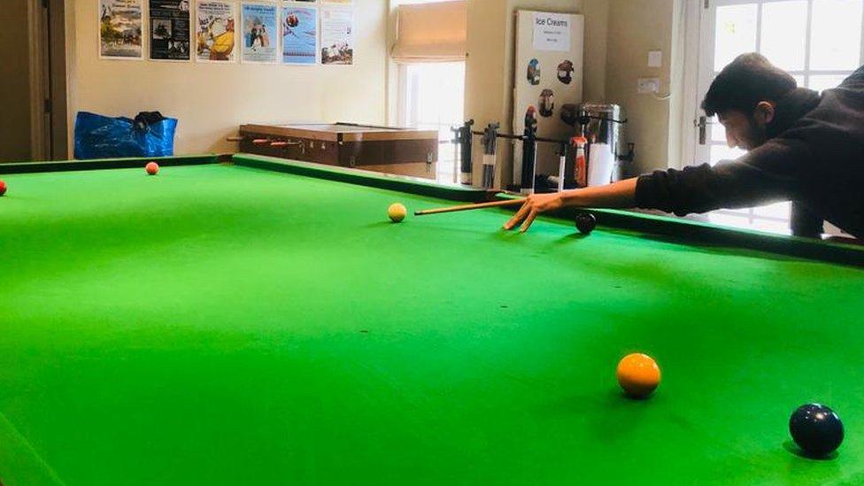 Rahim playing snooker in Northamptonshire