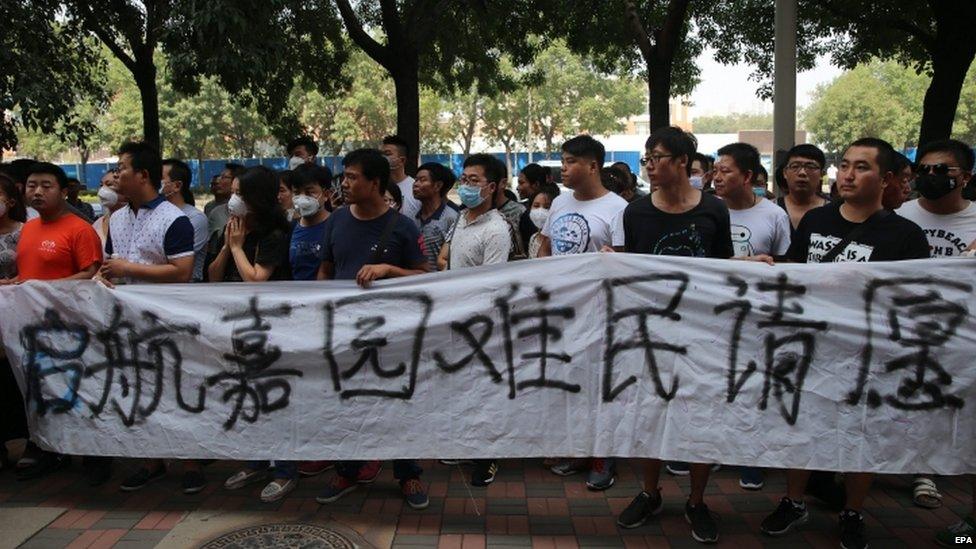 Local residents hold protest outside hotel used for news conferences - 16 August