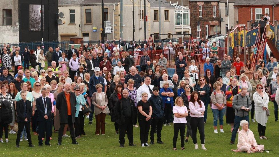 Members of the public in King George Harryville Park, Ballymena, to watch Chloe Mitchell's thanksgiving service