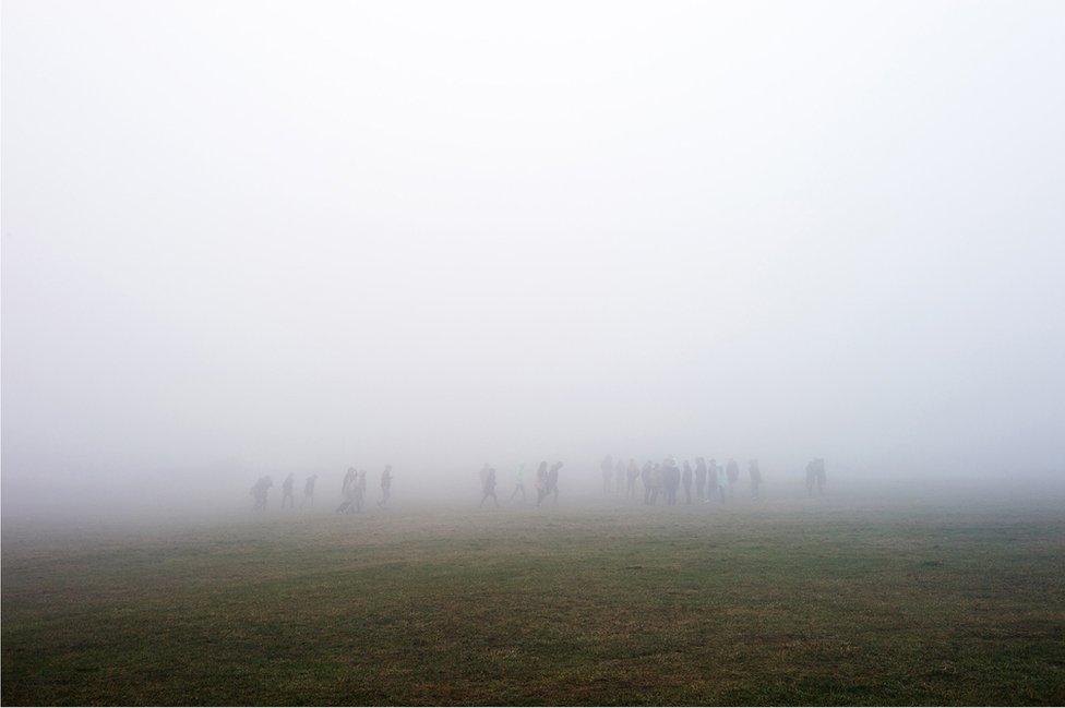 Figures in the mist