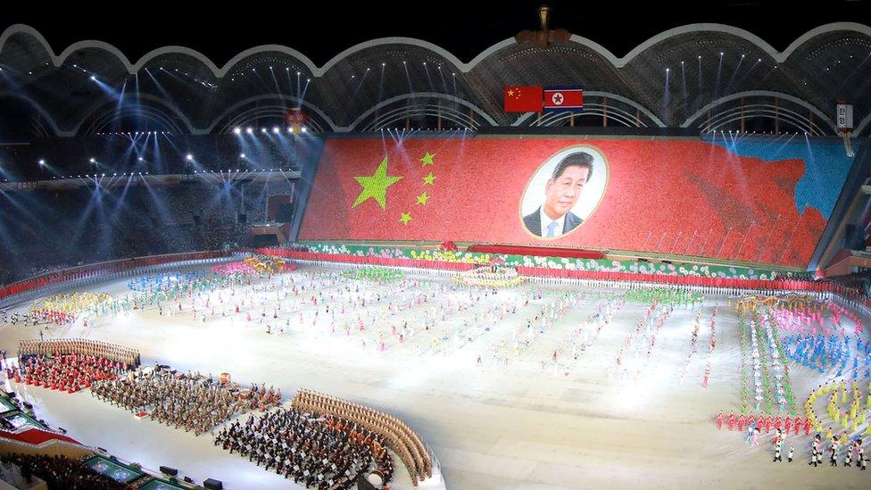 Display during a mass performance in a stadium