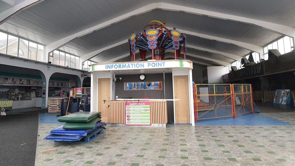 A visitor information desk inside Barry's Amusements