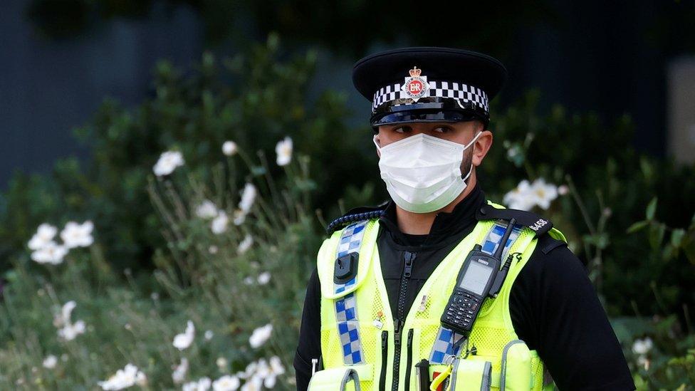 Policeman wearing mask