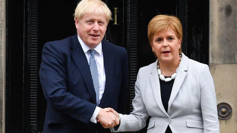 Nicola Sturgeon0 and Boris Johnson