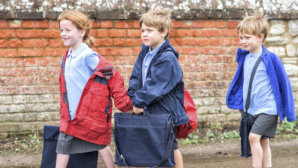 children-walking-to-school.