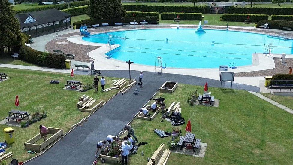 Drone shot of the pool and work taking place