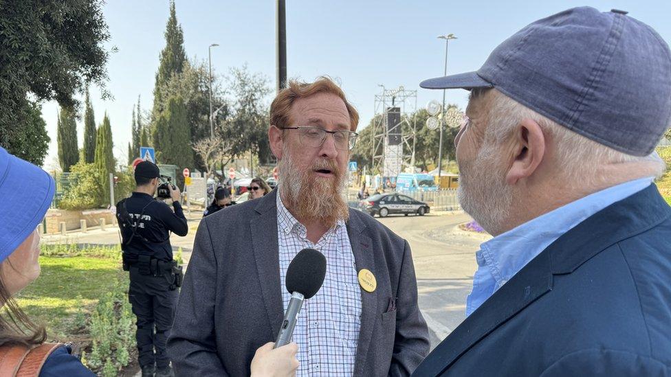 Yehuda Glick speaking to Jeremy Bowen