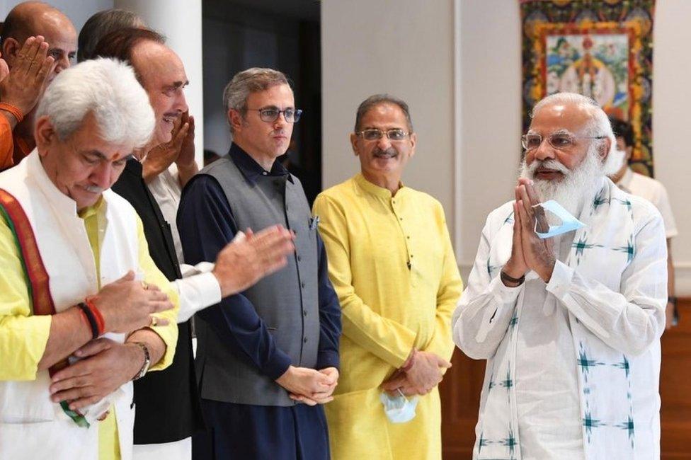 A handout photo made available by the Indian Prime Minister"s Office shows Indian Prime Minister Narendra Modi (R ) greeting members of different political parties from Jammu and Kashmir prior to their meeting in New Delhi, India 24 June 2021.