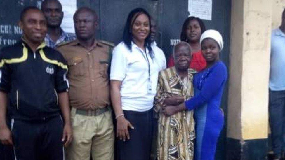 Celestine Egbunuche with his daughter and NGO workers