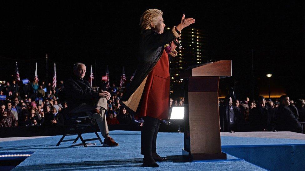 Hillary Clinton attends a campaign event with her running mate Tim Kaine, 22 October, at Penn Park in Philadelphia, Pennsylvania