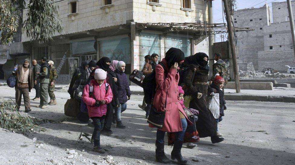 Residents flee east Aleppo as government forces push into rebel-held areas, 12 December 2016. Syria's military said Monday it has regained control of 98% of eastern Aleppo.