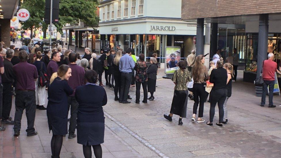 Staff and shoppers outside Jarrold