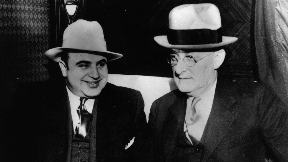 American gangster Al Capone (l) with US Marshal Laubenheimar (r)