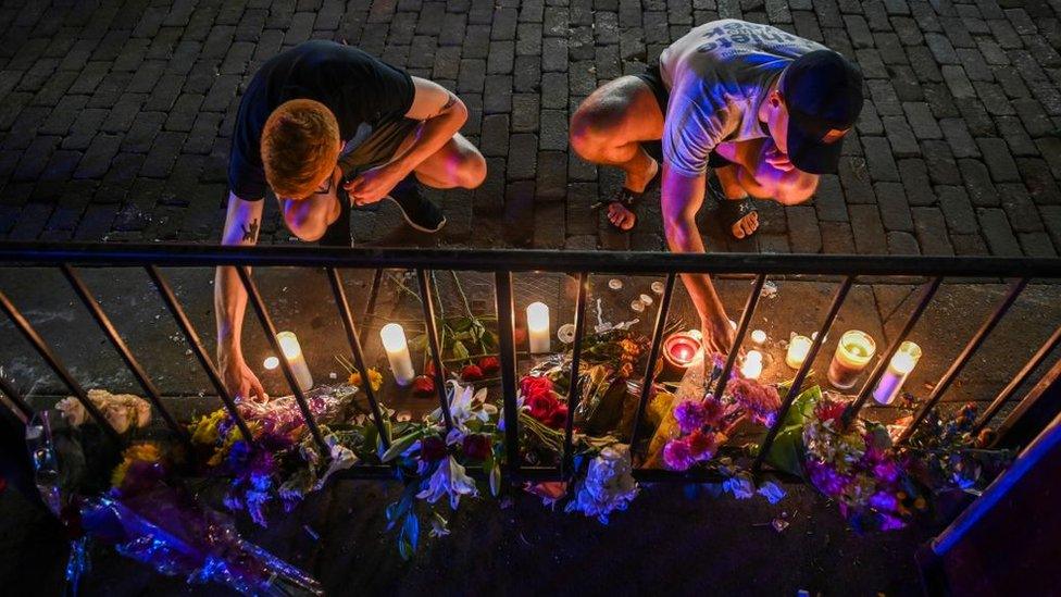 A makeshift memorial at the scene of Dayton, Ohio's mass shooting in August