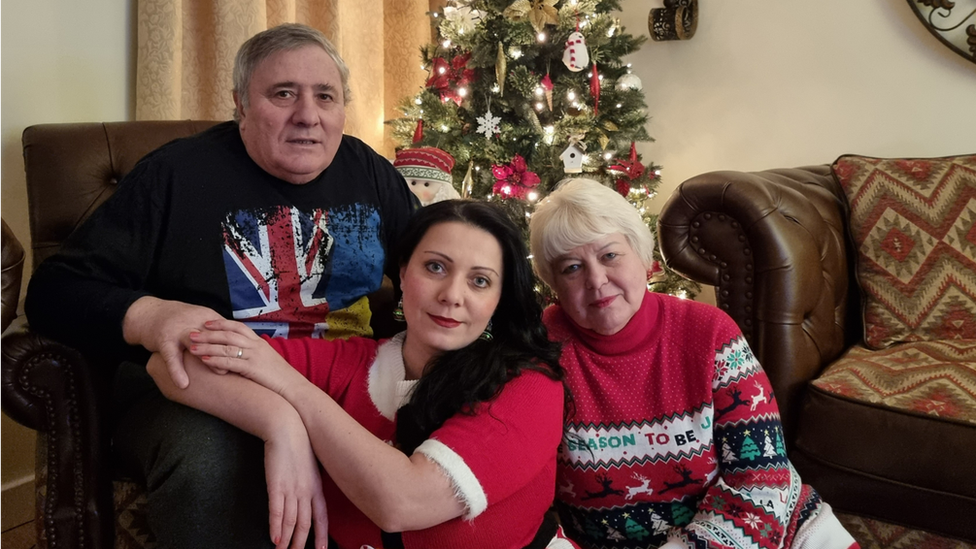 Iryna King with her parents