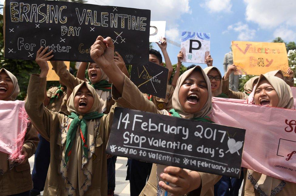 Muslim students shout slogans during a protest against Valentine's Day celebrations in Surabaya, Indonesia, on 13 February, 2017