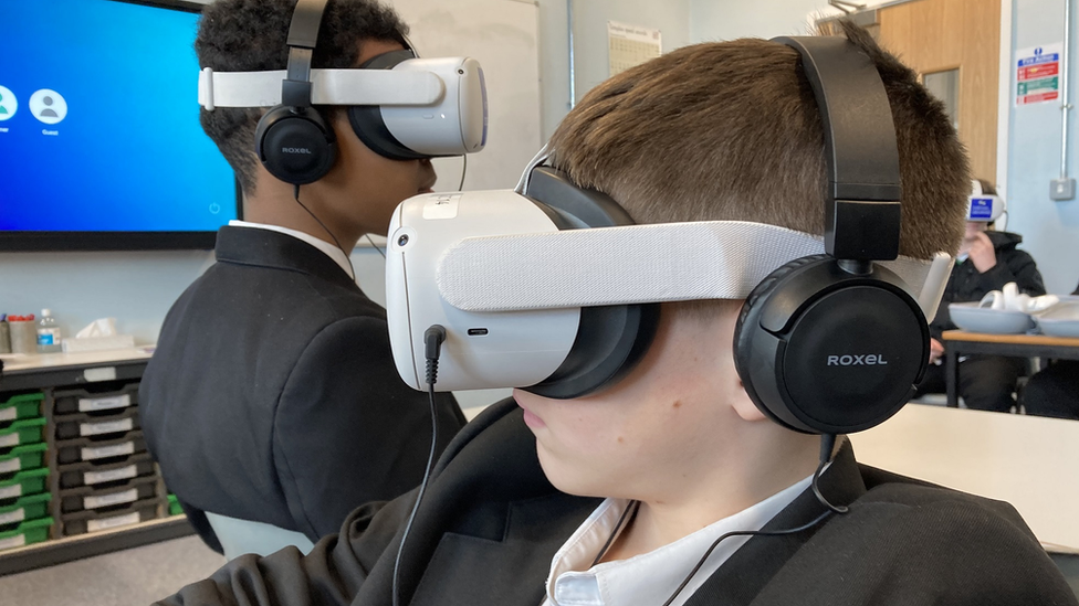 Children in VR headsets