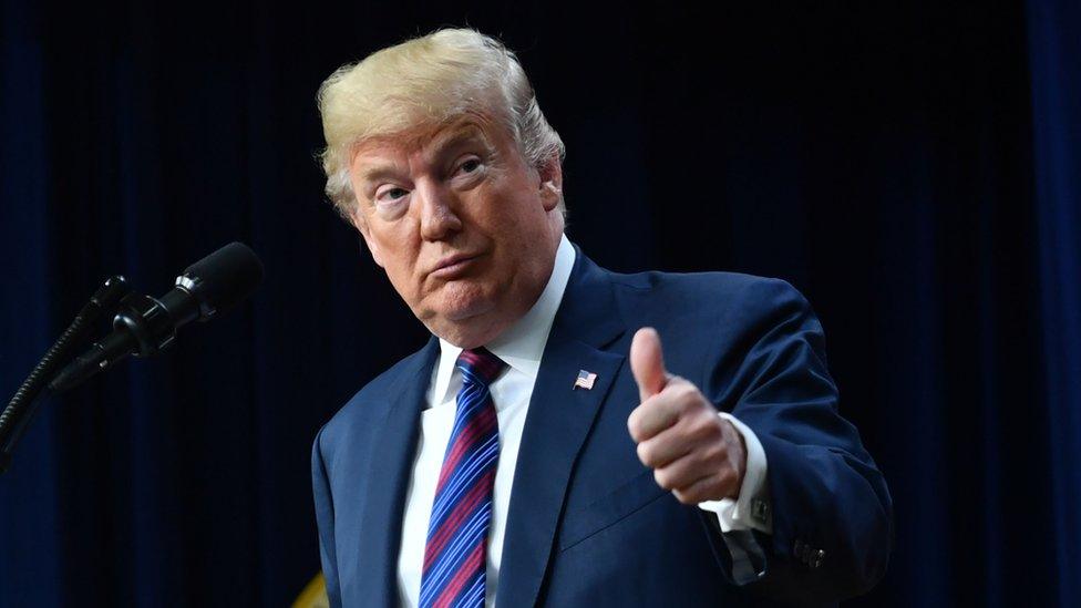 Donald Trump gives a thumbs-up