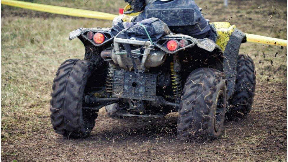 Close up of a quad bikes back wheels