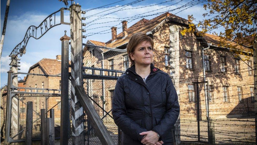 First Minister outside the camp in Auschwitz