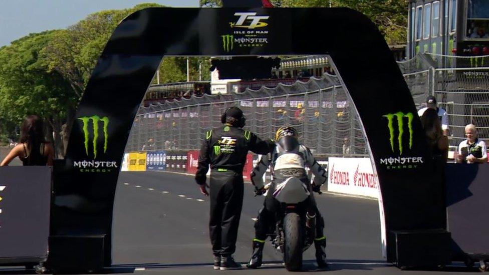 A rider at the start finish line of the TT course