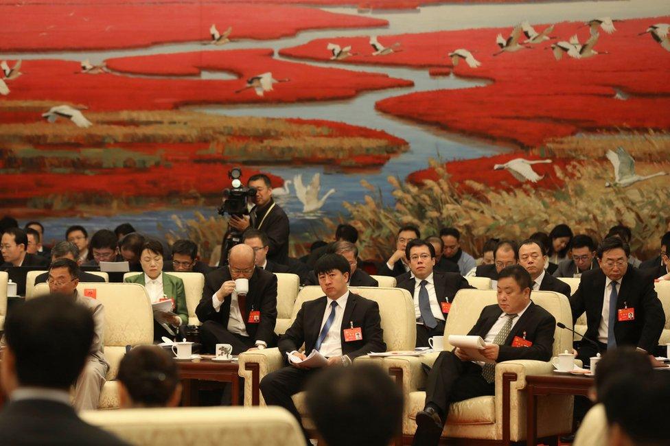 Chinese delegates attend the open delegation discussions of the 19th National Congress of the Communist Party of China (CPC) at the Great Hall of the People (GHOP) in Beijing, China, 19 October 2017.