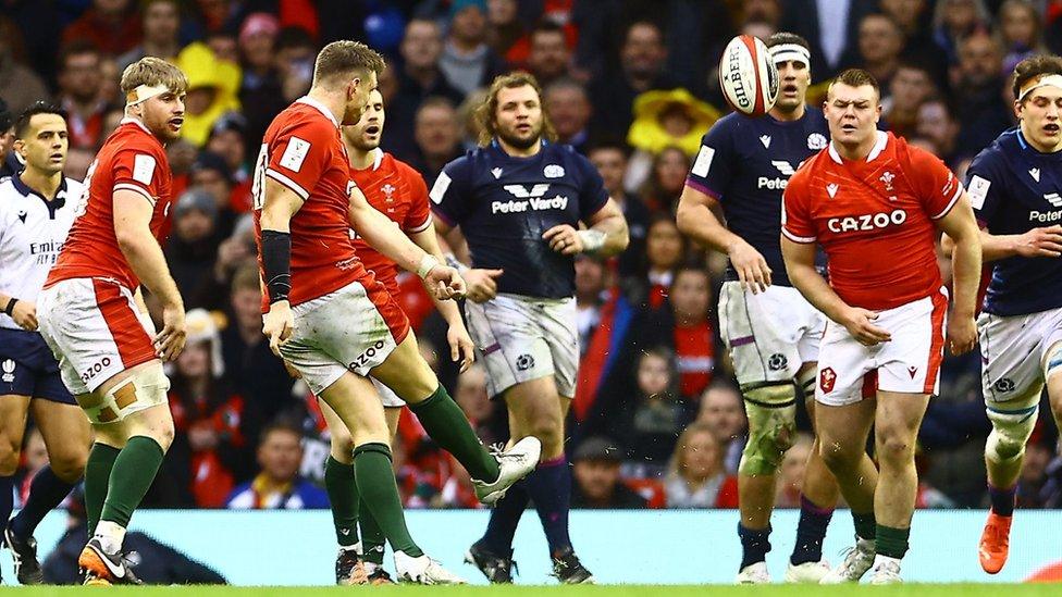 Dan Biggar scores a drop-goal for Wales