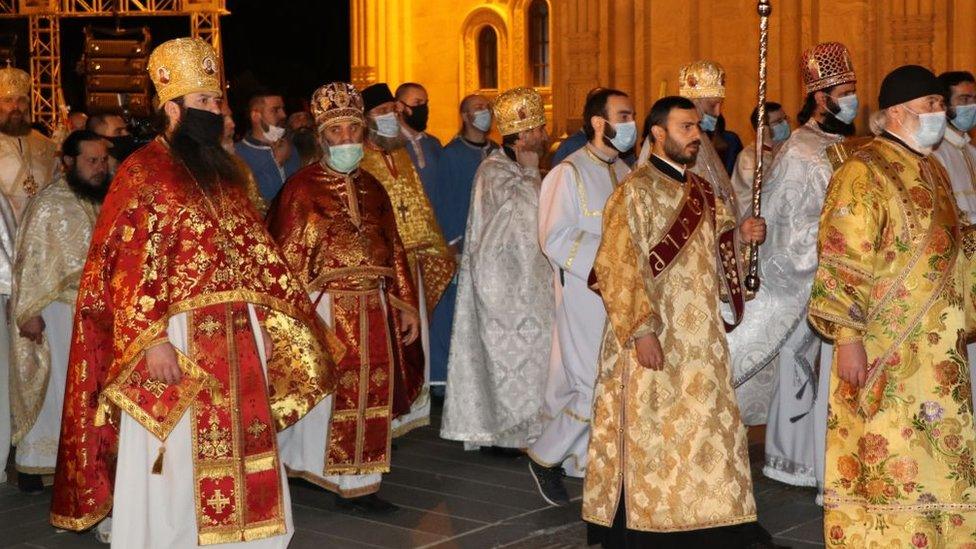 Georgians gather for Easter in Tbilisi wearing face masks