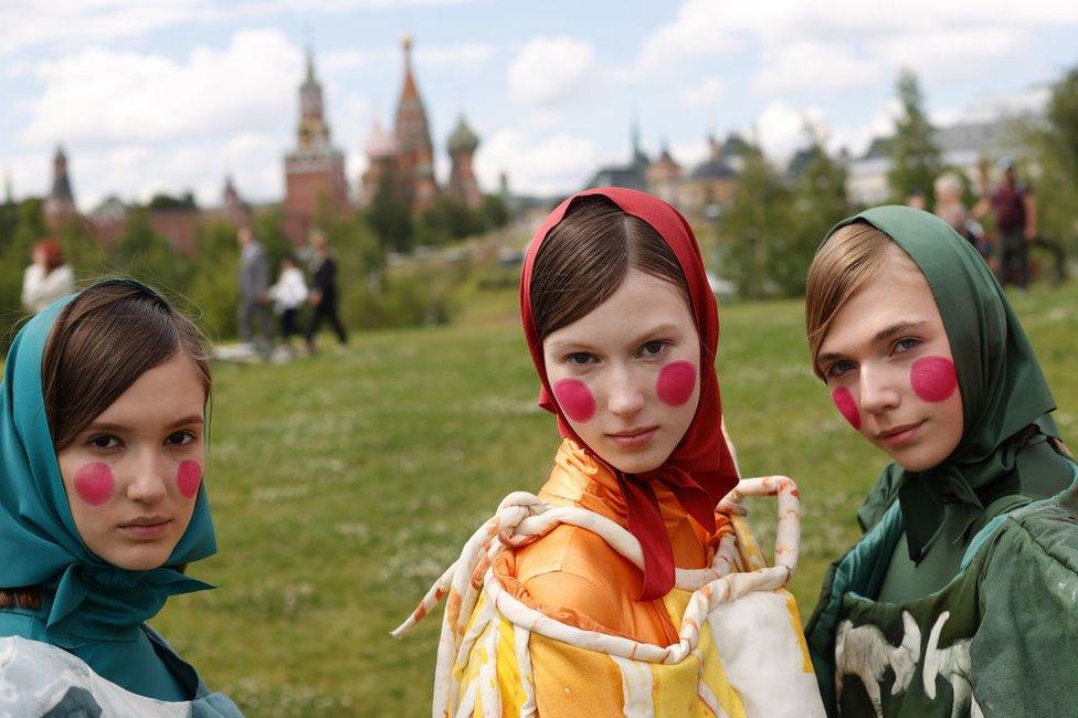 Models wear Sergey Sysoev Fashion School's creation for the Moscow Fashion Week in Zaryadye Park in Moscow, Russia on June 22, 2022.