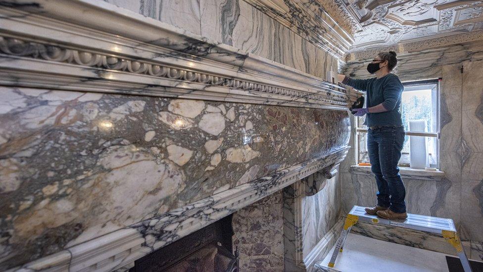 Conservation work on the fireplace