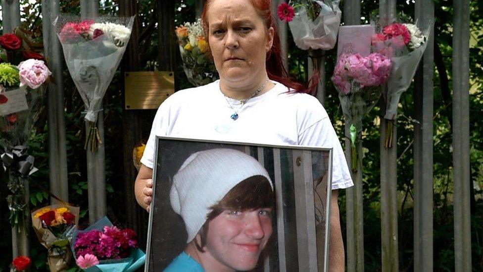 Beckie Ramsay holding a picture of her son Dylan