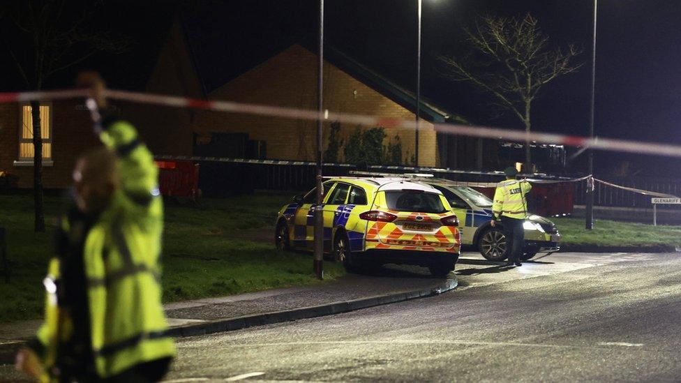 A police car sits outside a home in Portrush