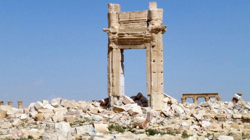 A general view shows the remains of the entrance to the iconic Temple of Bel that was destroyed by Islamic State (IS) group jihadists in September 2015 in the ancient city of Palmyra, after government troops recaptured the UNESCO world heritage site from the IS group on March 27, 201