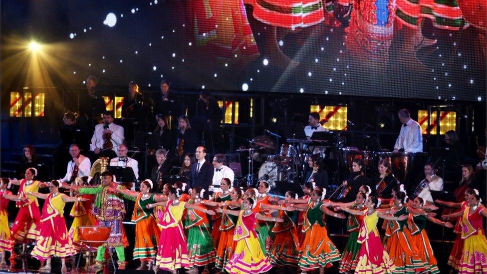 Dancers perform on stage at Wembley Stadium prior to Indian Prime Minister Narendra Modi speaking